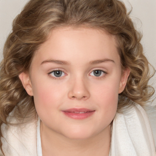 Joyful white child female with medium  brown hair and blue eyes