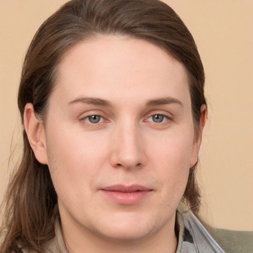 Neutral white young-adult female with long  brown hair and grey eyes