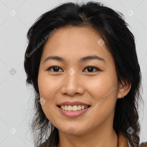 Joyful asian young-adult female with long  brown hair and brown eyes