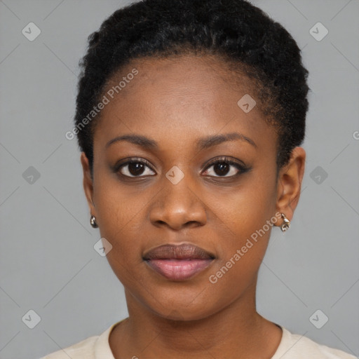 Joyful black young-adult female with short  black hair and brown eyes