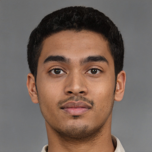 Neutral latino young-adult male with short  brown hair and brown eyes