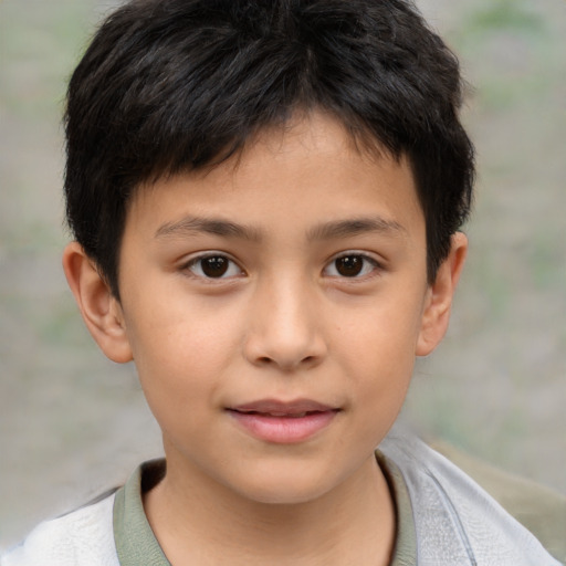 Joyful white child male with short  brown hair and brown eyes