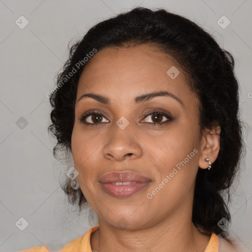 Joyful latino young-adult female with long  black hair and brown eyes