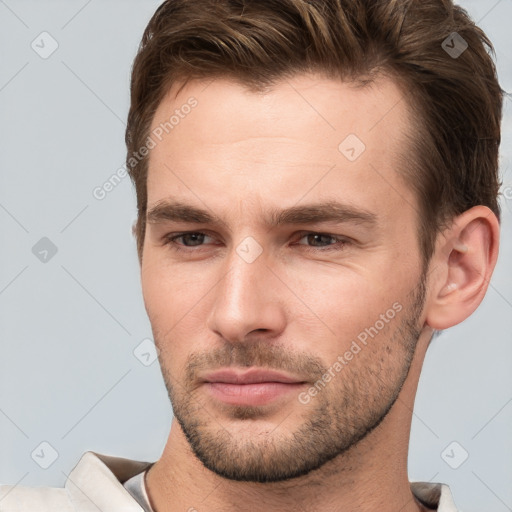 Neutral white young-adult male with short  brown hair and brown eyes