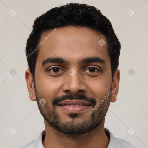 Joyful latino young-adult male with short  black hair and brown eyes