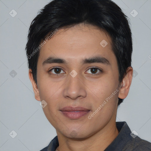 Joyful white young-adult male with short  black hair and brown eyes