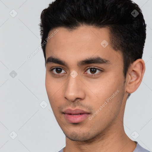 Neutral latino young-adult male with short  black hair and brown eyes