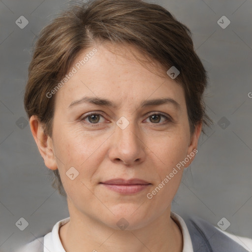 Joyful white adult female with short  brown hair and brown eyes