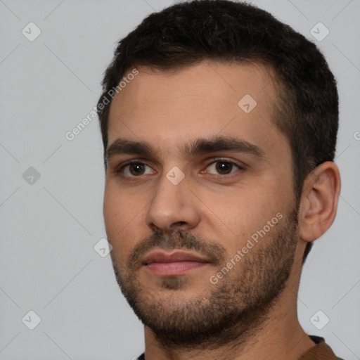 Neutral white young-adult male with short  brown hair and brown eyes