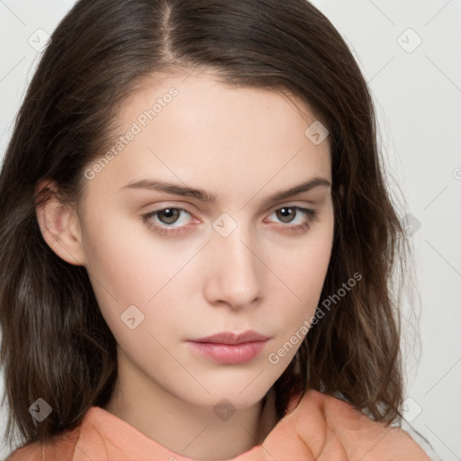 Neutral white young-adult female with medium  brown hair and brown eyes