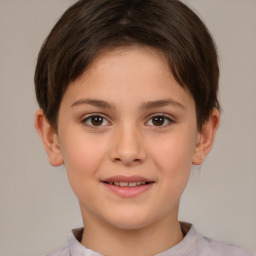 Joyful white child female with short  brown hair and brown eyes