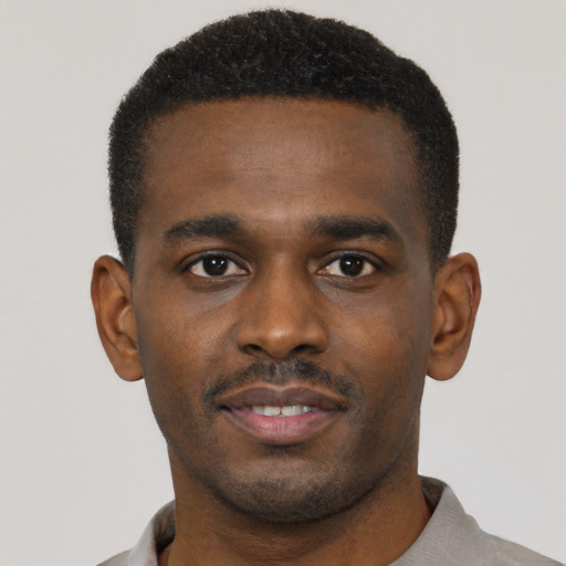 Neutral black young-adult male with short  black hair and brown eyes