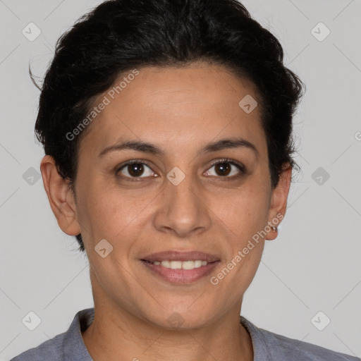 Joyful white adult female with short  brown hair and brown eyes