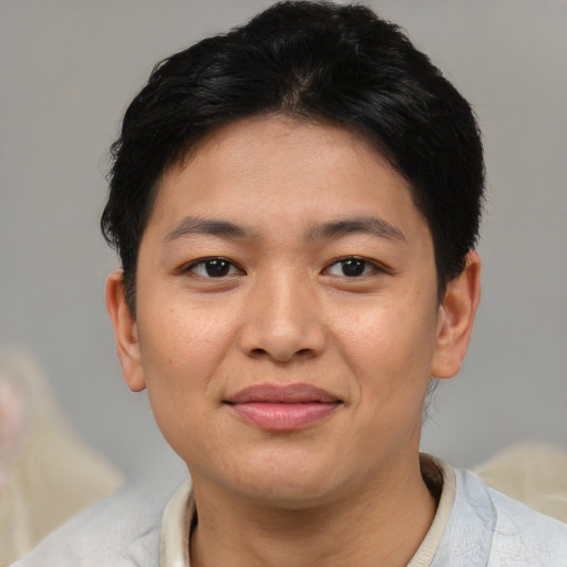 Joyful asian young-adult female with short  black hair and brown eyes