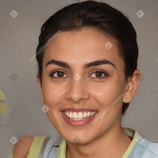 Joyful white young-adult female with short  brown hair and brown eyes