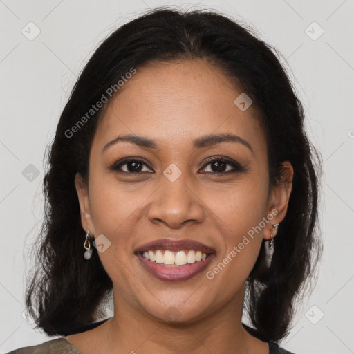 Joyful latino young-adult female with long  brown hair and brown eyes