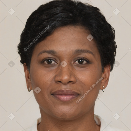 Joyful black adult female with short  brown hair and brown eyes