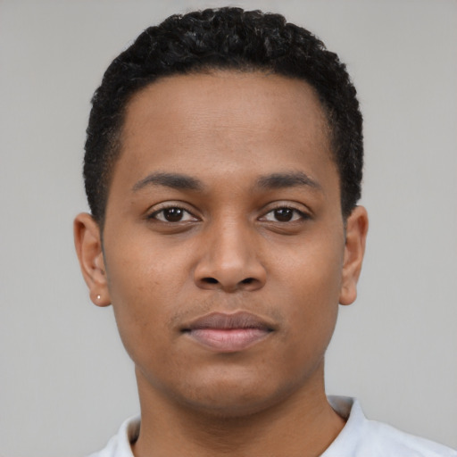 Neutral black young-adult male with short  brown hair and brown eyes
