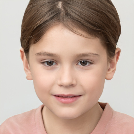 Joyful white child female with short  brown hair and brown eyes