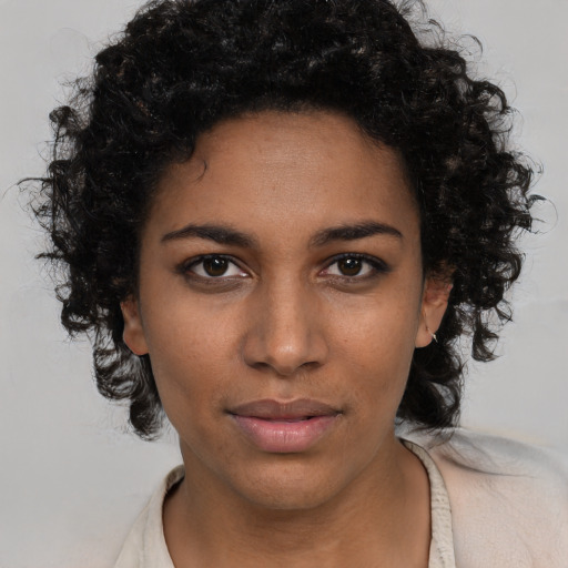 Neutral black young-adult female with medium  black hair and brown eyes
