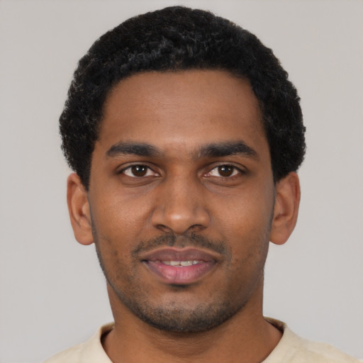 Neutral black young-adult male with short  black hair and brown eyes