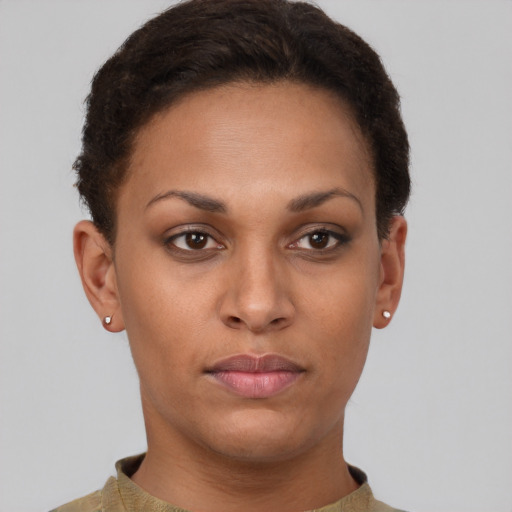 Neutral latino young-adult female with short  brown hair and brown eyes