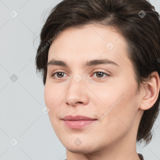 Joyful white young-adult male with medium  brown hair and brown eyes