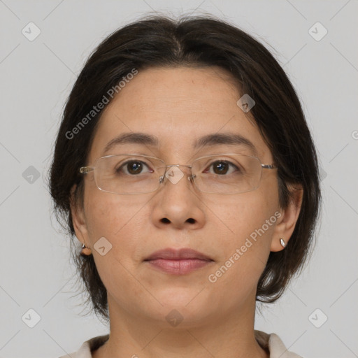 Joyful white adult female with medium  brown hair and brown eyes