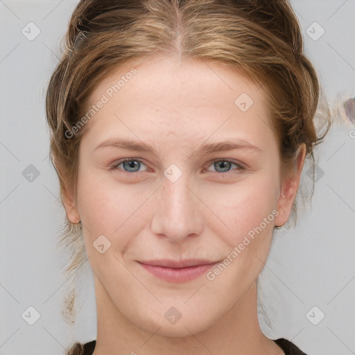 Joyful white young-adult female with medium  brown hair and blue eyes