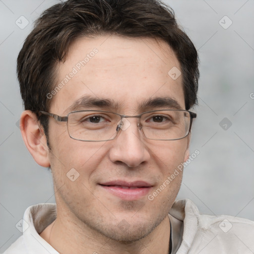 Joyful white adult male with short  brown hair and brown eyes