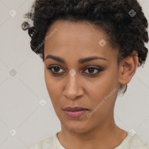 Neutral black young-adult female with short  brown hair and brown eyes