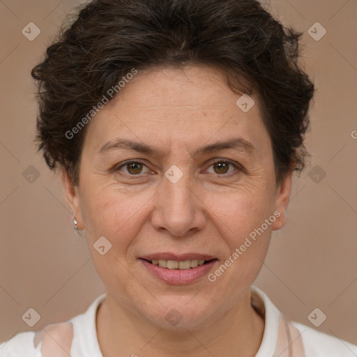 Joyful white adult female with short  brown hair and brown eyes