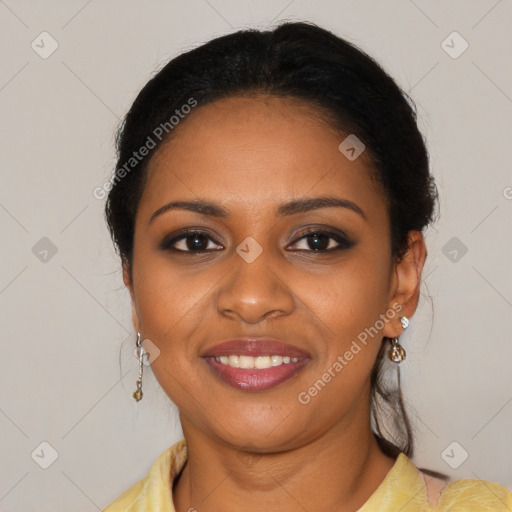 Joyful black young-adult female with long  brown hair and brown eyes