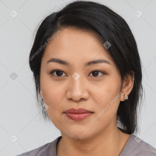 Joyful asian young-adult female with medium  black hair and brown eyes