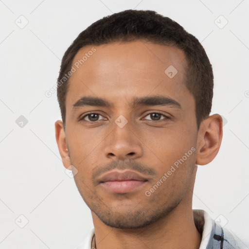 Neutral latino young-adult male with short  brown hair and brown eyes