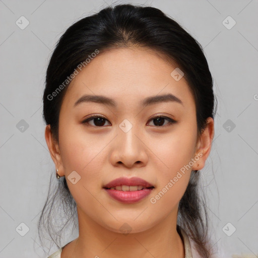 Joyful asian young-adult female with medium  brown hair and brown eyes