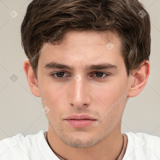 Neutral white young-adult male with short  brown hair and brown eyes