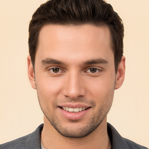 Joyful white young-adult male with short  brown hair and brown eyes