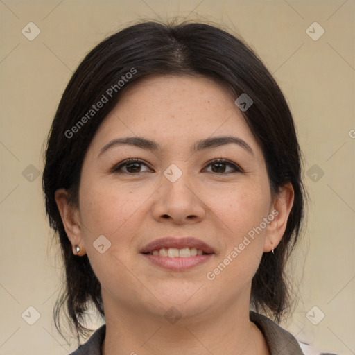 Joyful asian young-adult female with medium  brown hair and brown eyes