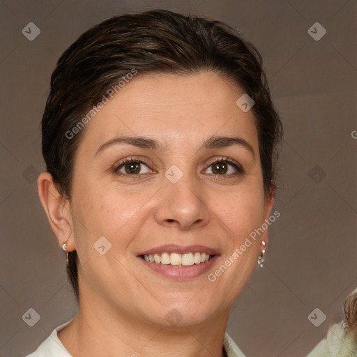 Joyful white adult female with medium  brown hair and brown eyes