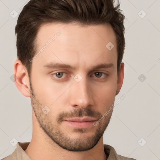 Neutral white young-adult male with short  brown hair and grey eyes