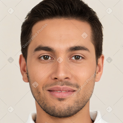 Joyful white young-adult male with short  brown hair and brown eyes