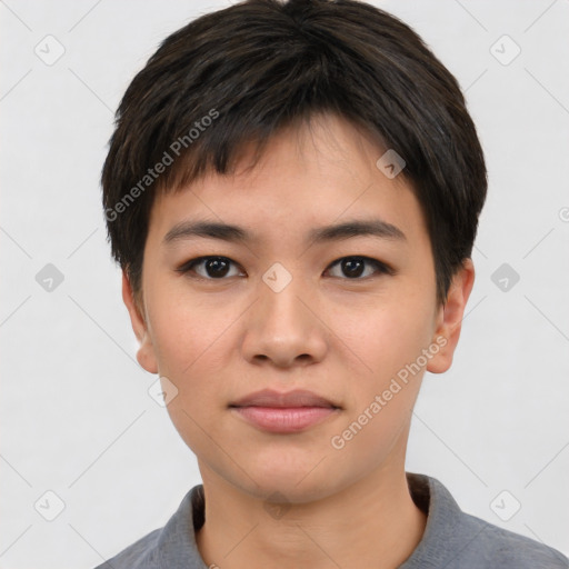 Joyful asian young-adult female with short  black hair and brown eyes