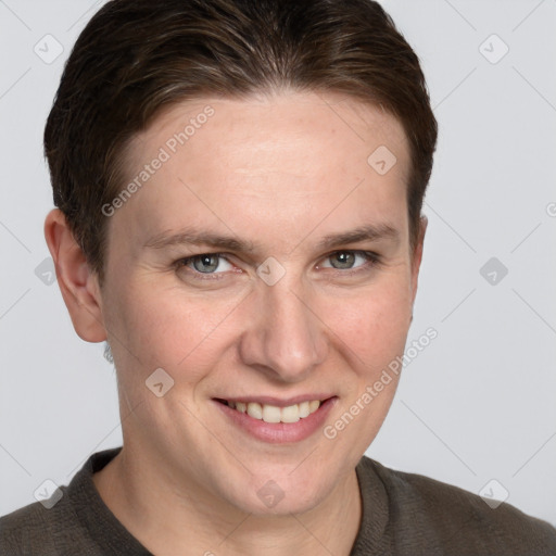 Joyful white adult female with short  brown hair and grey eyes