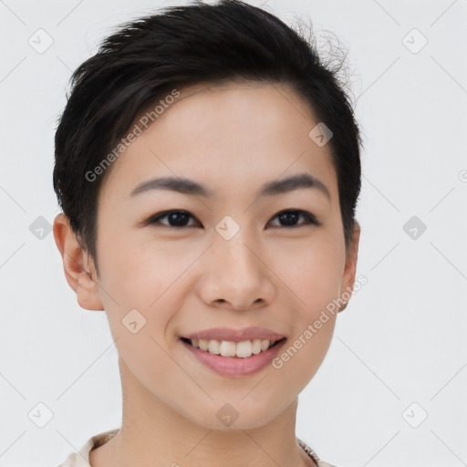 Joyful asian young-adult female with short  black hair and brown eyes