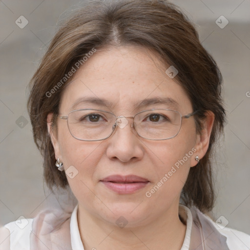 Joyful white adult female with medium  brown hair and grey eyes