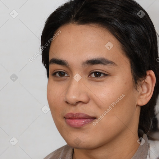 Joyful asian young-adult female with medium  brown hair and brown eyes