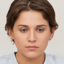 Neutral white young-adult female with short  brown hair and brown eyes