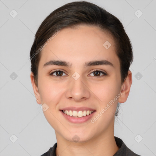 Joyful white young-adult female with medium  brown hair and brown eyes