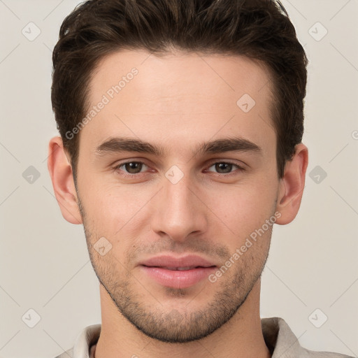 Joyful white young-adult male with short  brown hair and brown eyes